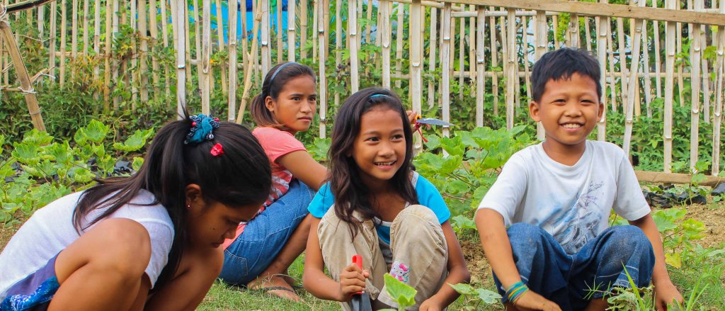 kyla-with-her-fellow-gardeners-during-the-regular-afternoon-cleaning-1.jpg